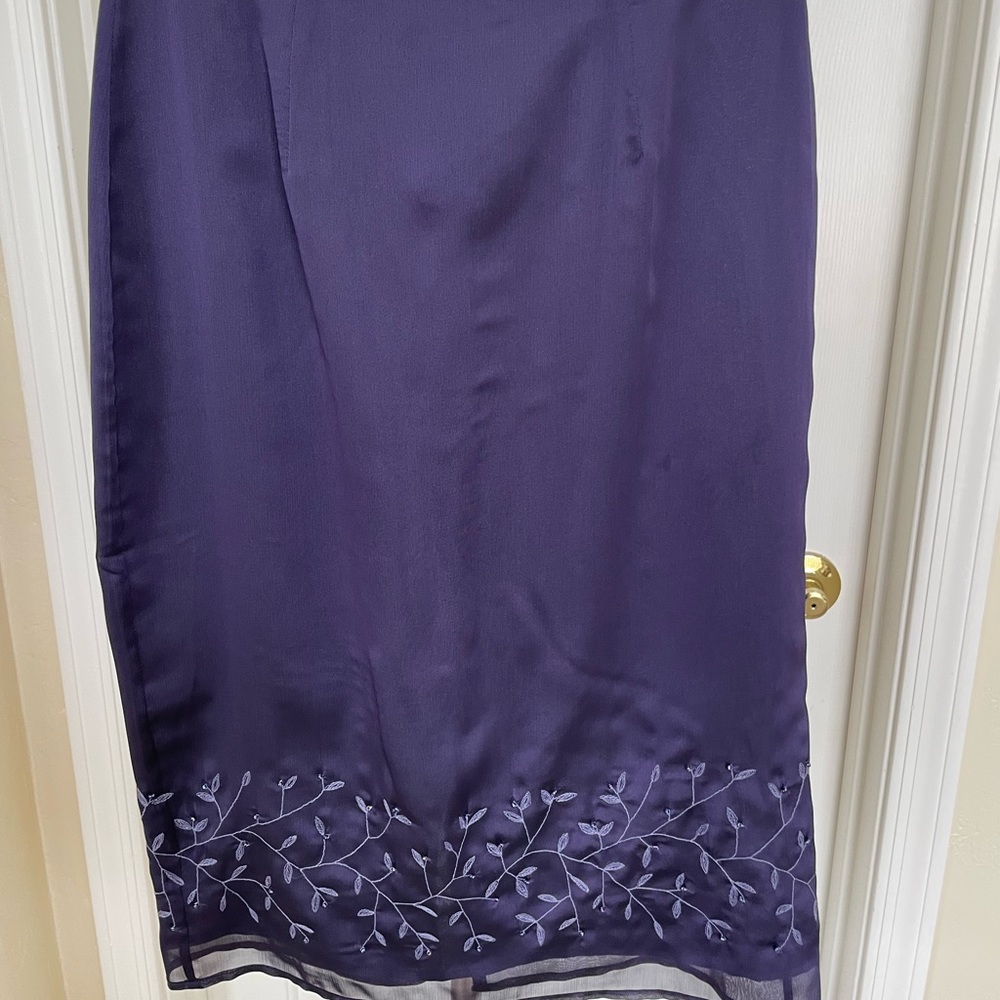 Purple silky skirt .